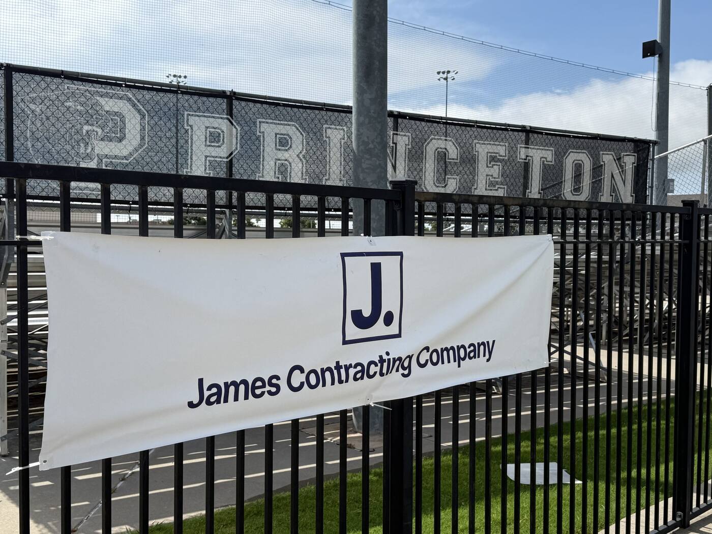James Contracting Company banner on the fence at the Princeton baseball field